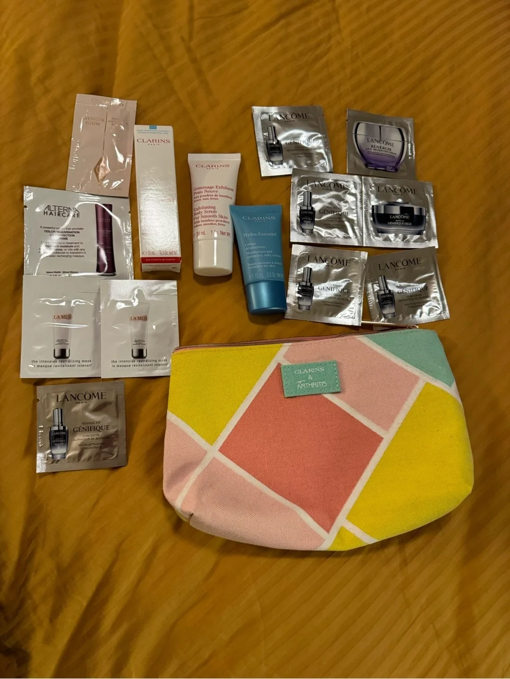 Clarins Pouch with Clarins and other product samples